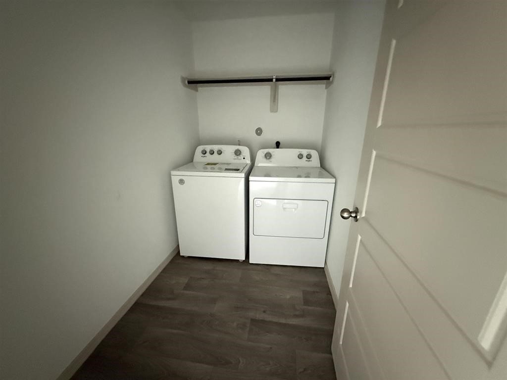 6710 Riplee Street Beaumont, TX 77708 - Photo 13 of 15 a utility room with dryer and washer