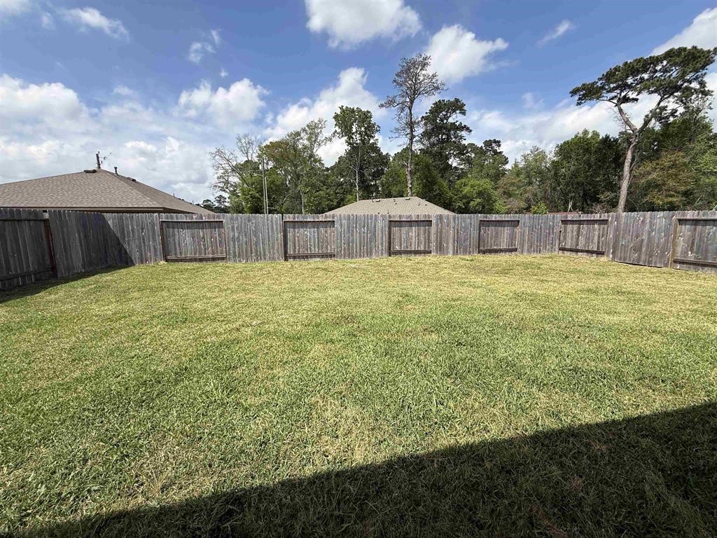 6710 Riplee Street Beaumont, TX 77708 - Photo 15 of 15 a bathroom with a yard