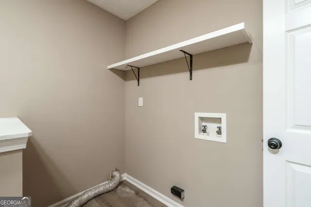 a view of a hallway with closet