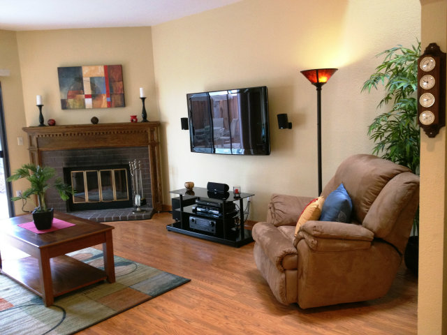 277 Michigan Road Milpitas, CA 95035 - Photo 13 of 25 a living room with furniture and a fireplace