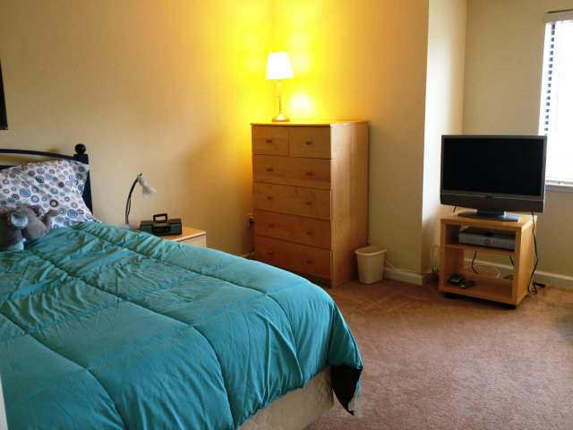 277 Michigan Road Milpitas, CA 95035 - Photo 18 of 25 a bedroom with a bed and flat screen tv