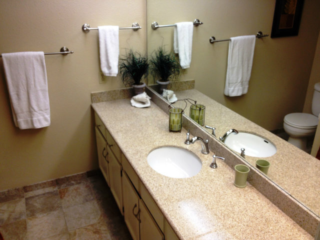 277 Michigan Road Milpitas, CA 95035 - Photo 20 of 25 a bathroom with a granite countertop sink and a mirror