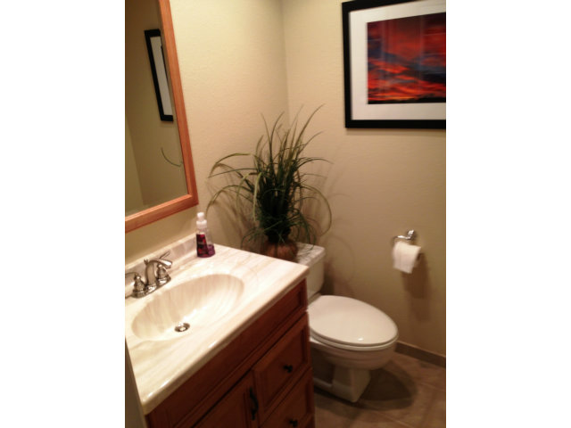 277 Michigan Road Milpitas, CA 95035 - Photo 22 of 25 a bathroom with a toilet a sink and mirror