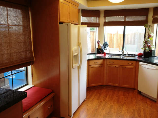 277 Michigan Road Milpitas, CA 95035 - Photo 6 of 25 a kitchen with a sink and cabinets