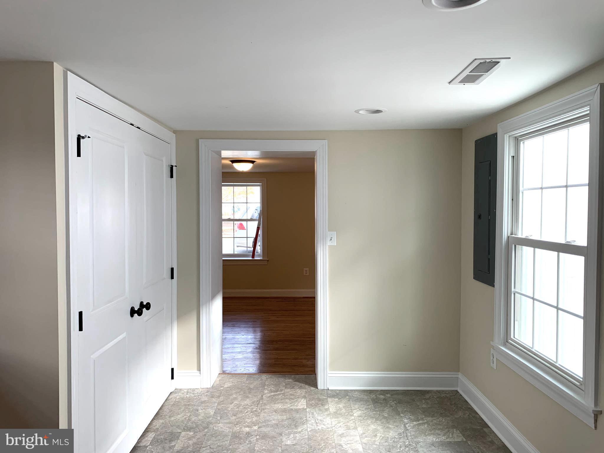 116 North Main Street Boonsboro, MD 21713 - Photo 13 of 44 a view of entryway with wooden floor and cabinet