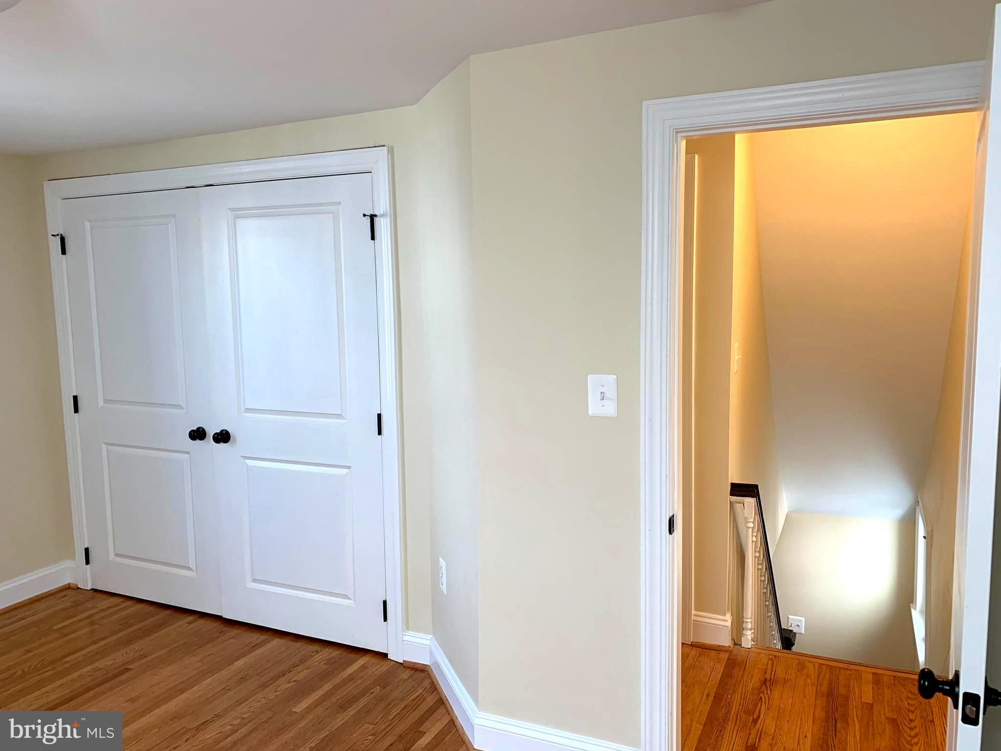 116 North Main Street Boonsboro, MD 21713 - Photo 36 of 44 a view of bedroom with a bed and wooden floor