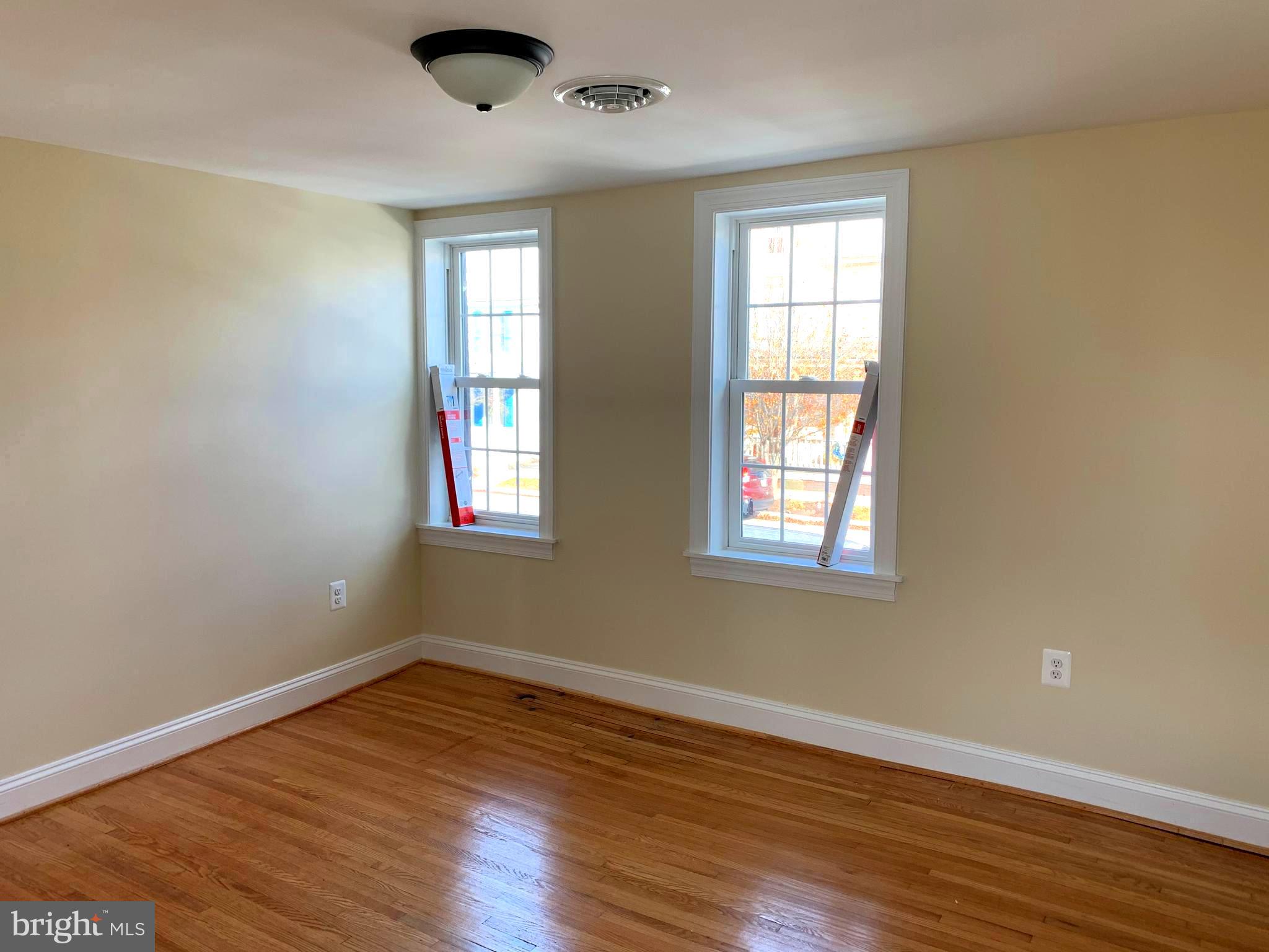 116 North Main Street Boonsboro, MD 21713 - Photo 40 of 44 a view of empty room with wooden floor and fan