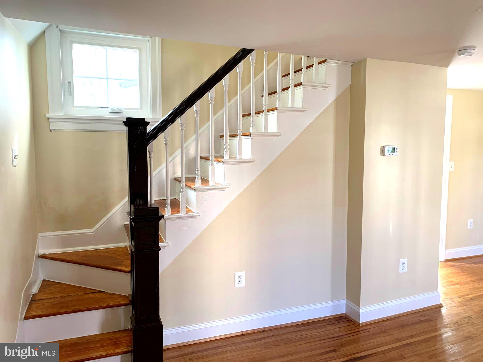 116 North Main Street Boonsboro, MD 21713 - Photo 5 of 44 a view of entryway with wooden floor and stairs
