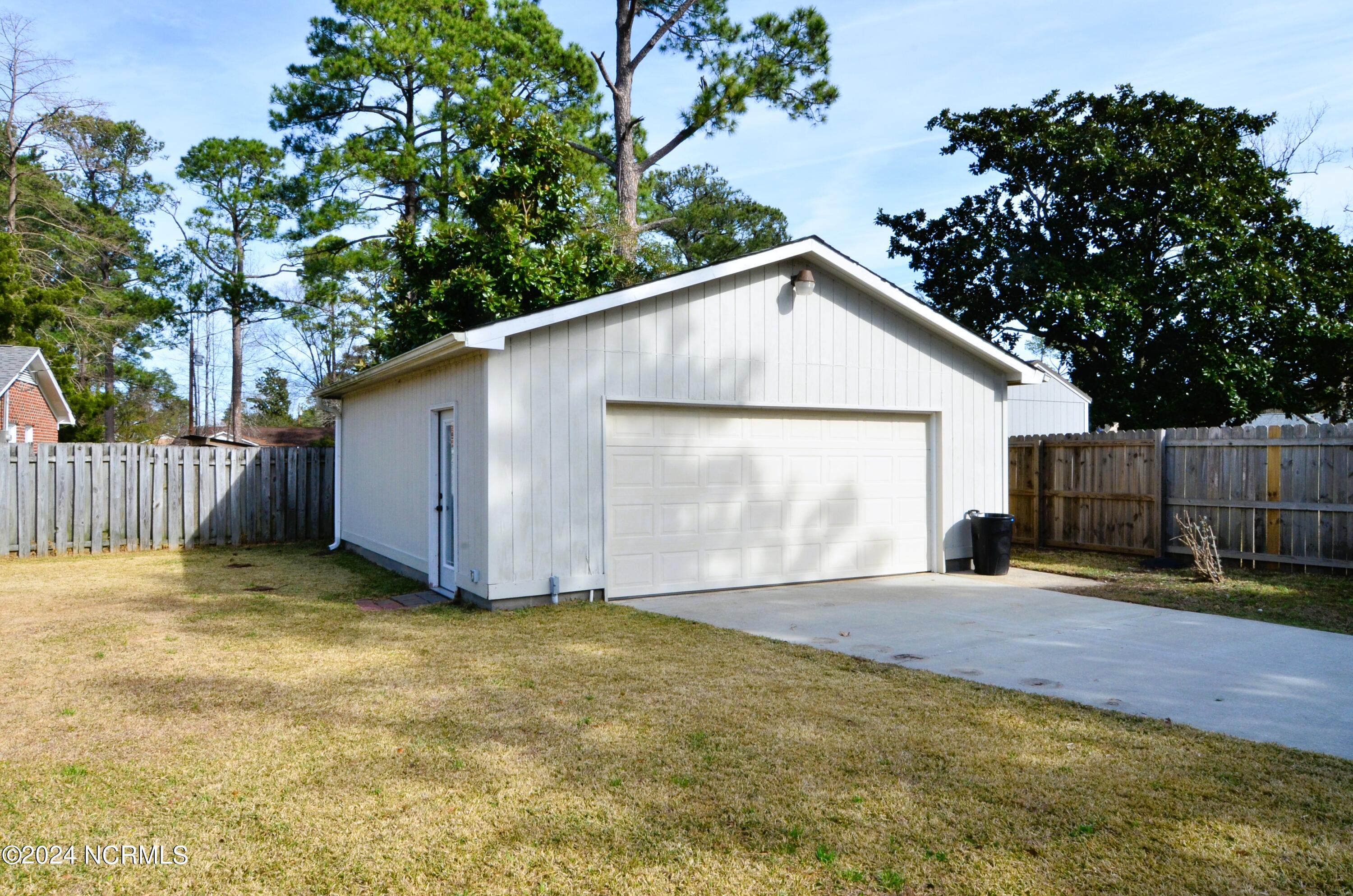4513 Bramton Road Wilmington, NC 28405 - Photo 20 of 45 Detached 2 car garage with 16' foot door