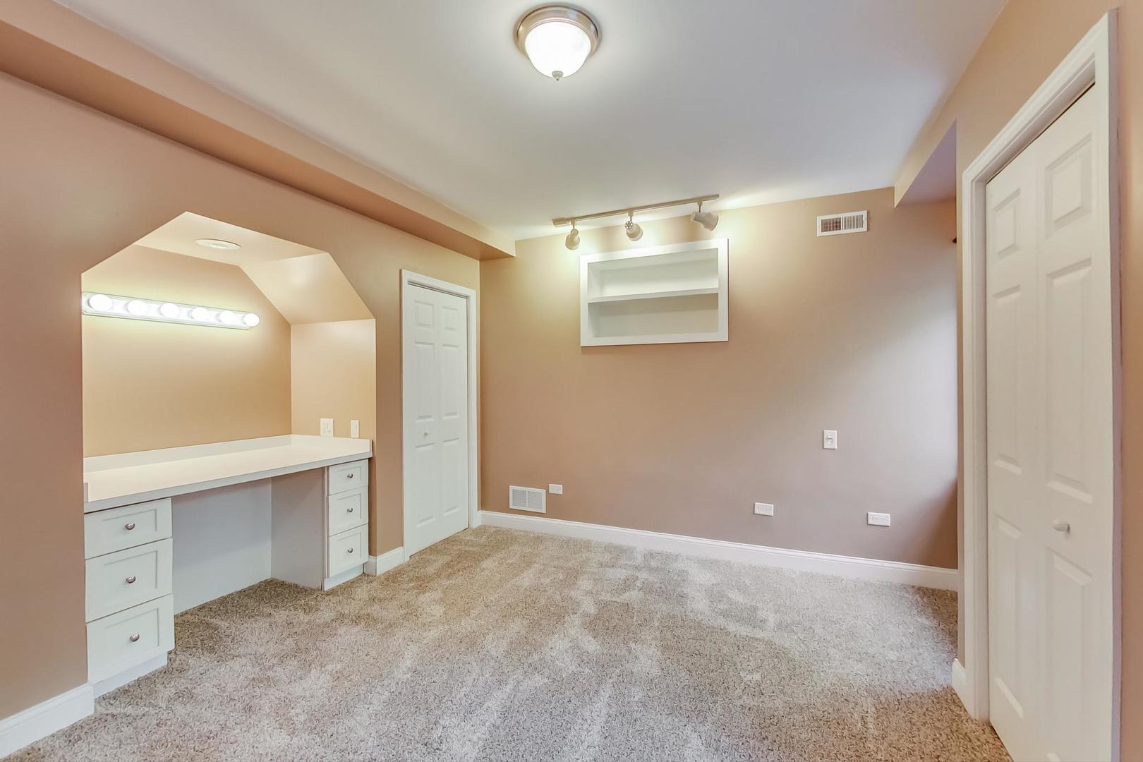 8901 Maple Avenue Burr Ridge, IL 60527 - Photo 43 of 68 a view of an empty room with window and bathroom
