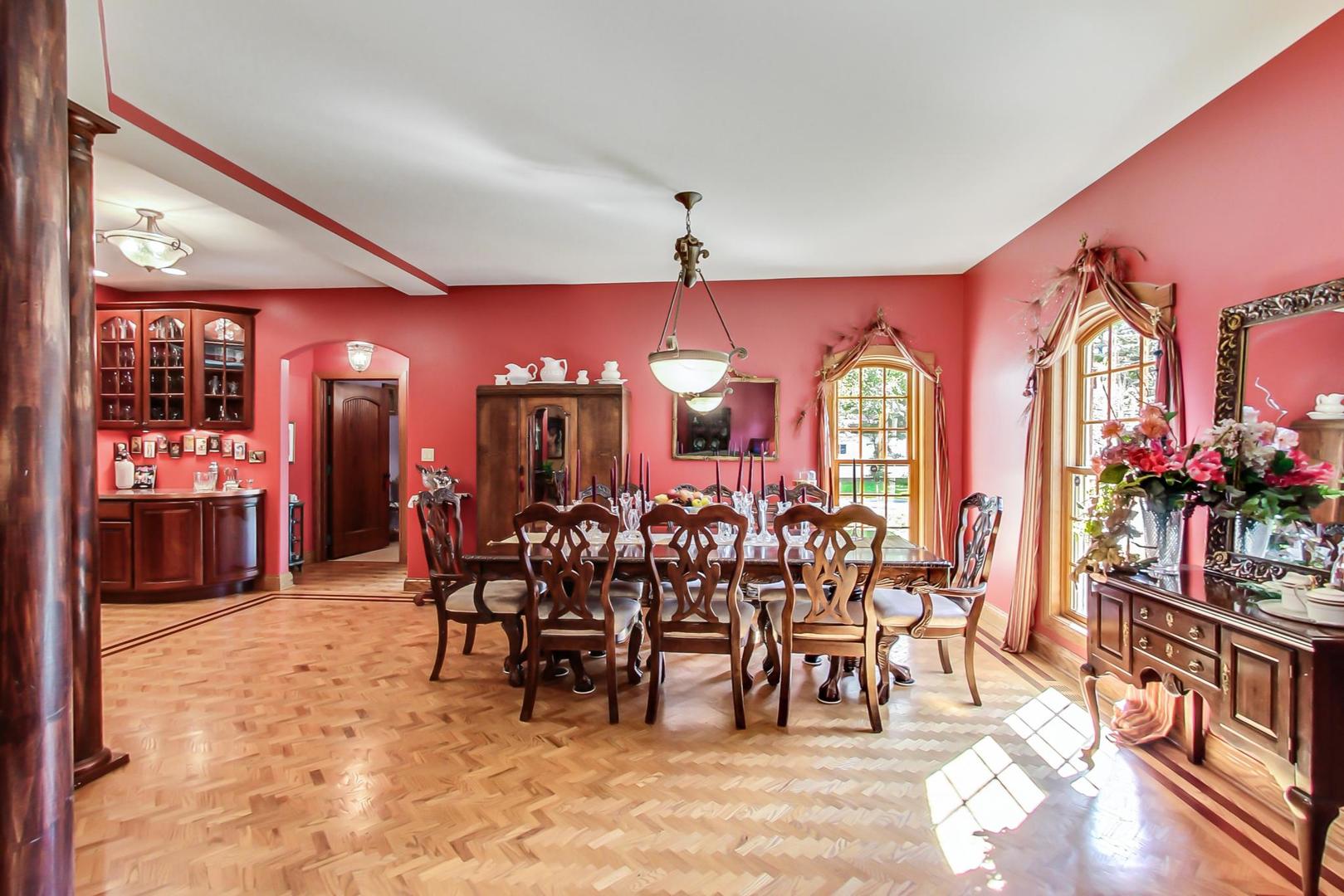 8901 Maple Avenue Burr Ridge, IL 60527 - Photo 7 of 68 a view of a dining room with furniture and chandelier