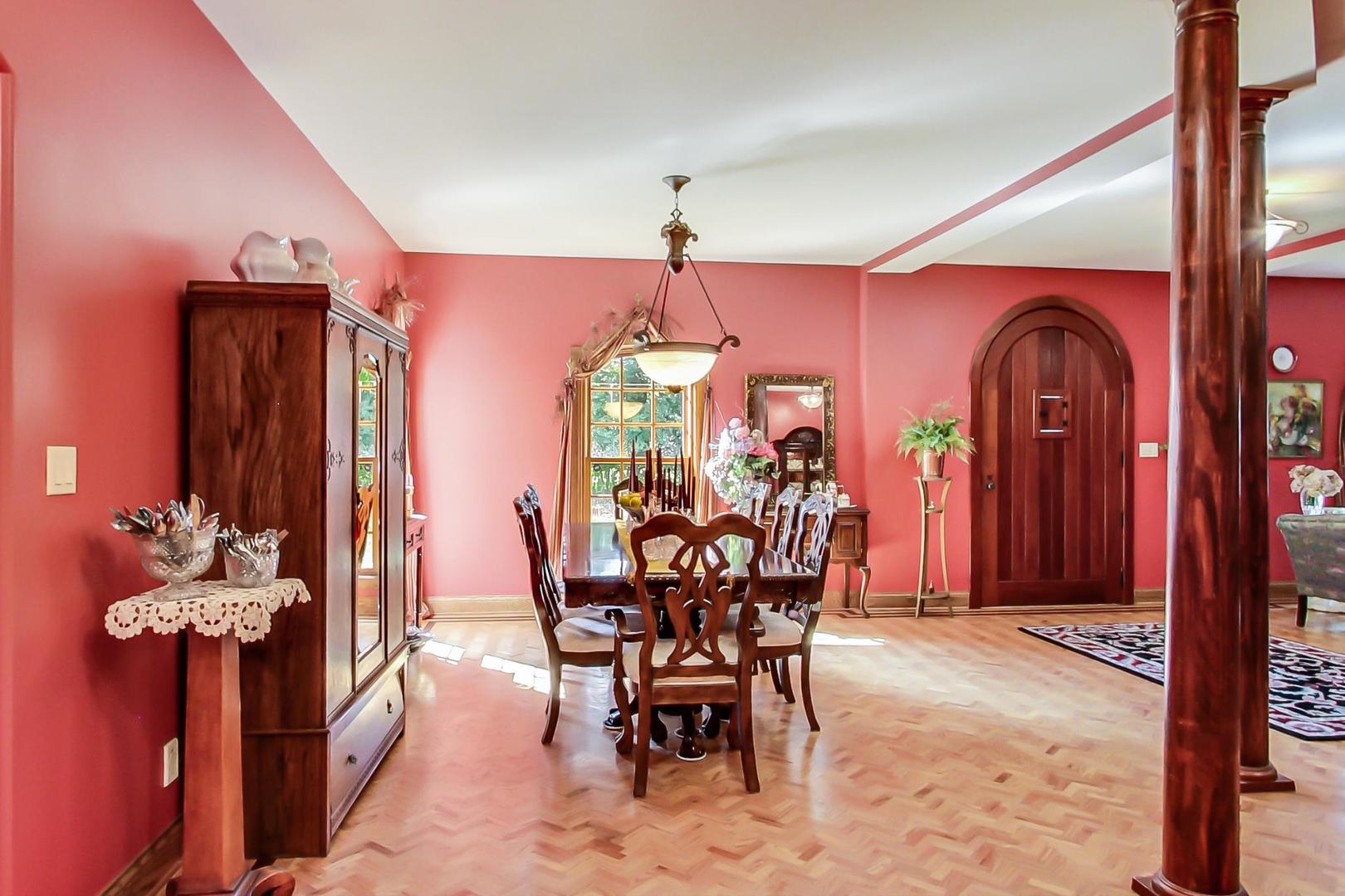 8901 Maple Avenue Burr Ridge, IL 60527 - Photo 9 of 68 a view of a dining room with furniture and chandelier