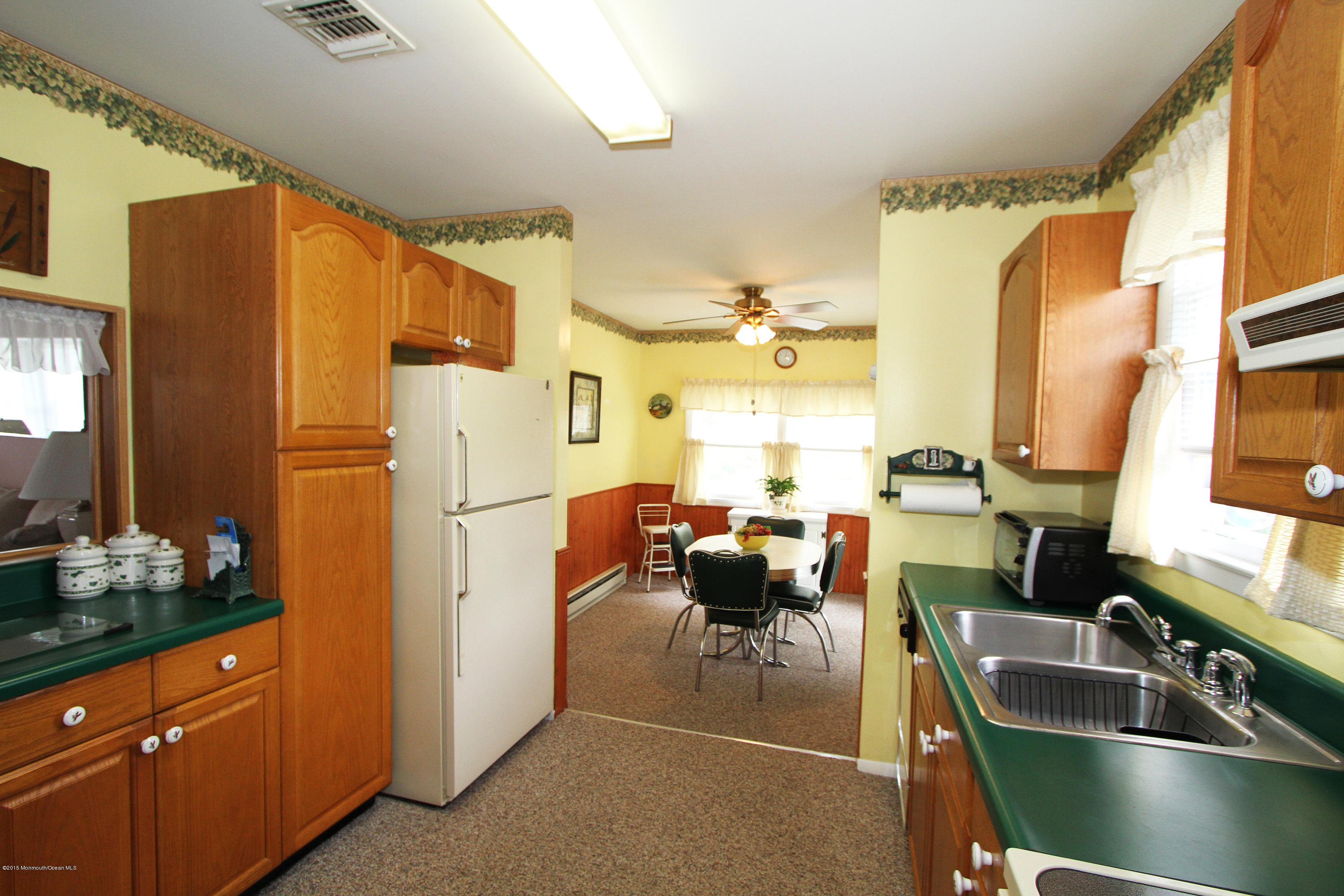 16 Churchill Road Whiting, NJ 08759 - Photo 3 of 19 View From Kitchen To Den