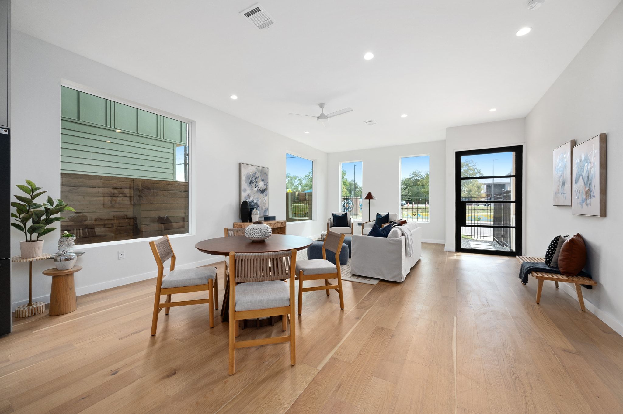 1104 1/2 Gunter Street Austin, TX 78702 - Photo 16 of 40 a living room with furniture and a wooden floor