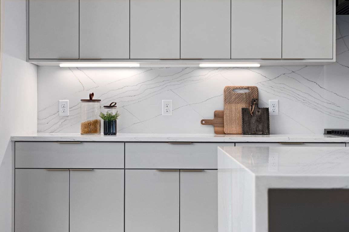 1104 Gunter Street, Unit 1/2 Austin, TX 78702 - Photo 17 of 40 a kitchen with a sink and cabinets