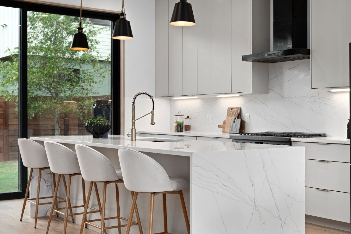 1104 Gunter Street, Unit 1/2 Austin, TX 78702 - Photo 20 of 40 a kitchen with a table chairs and window
