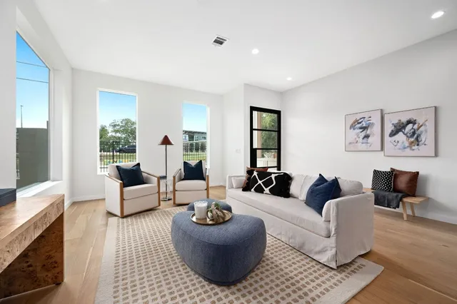 a living room with furniture and a couch