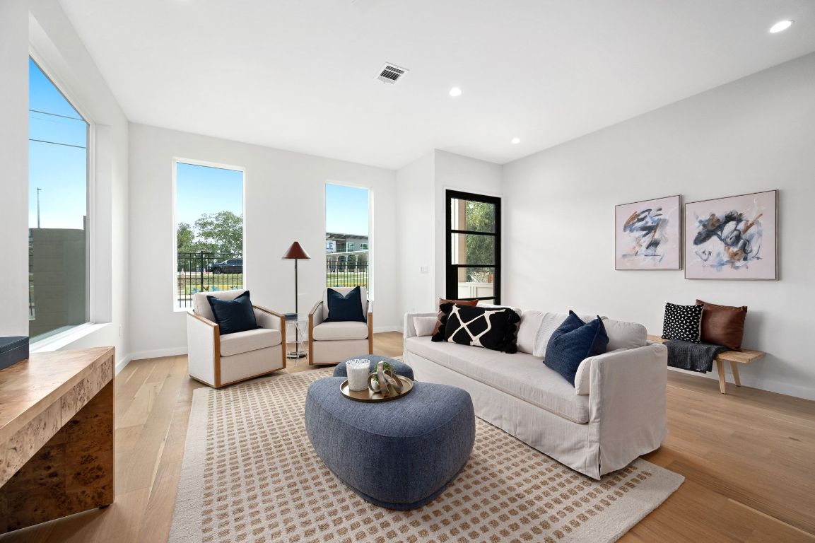 1104 Gunter Street, Unit 1/2 Austin, TX 78702 - Photo 2 of 40 a living room with furniture and a couch
