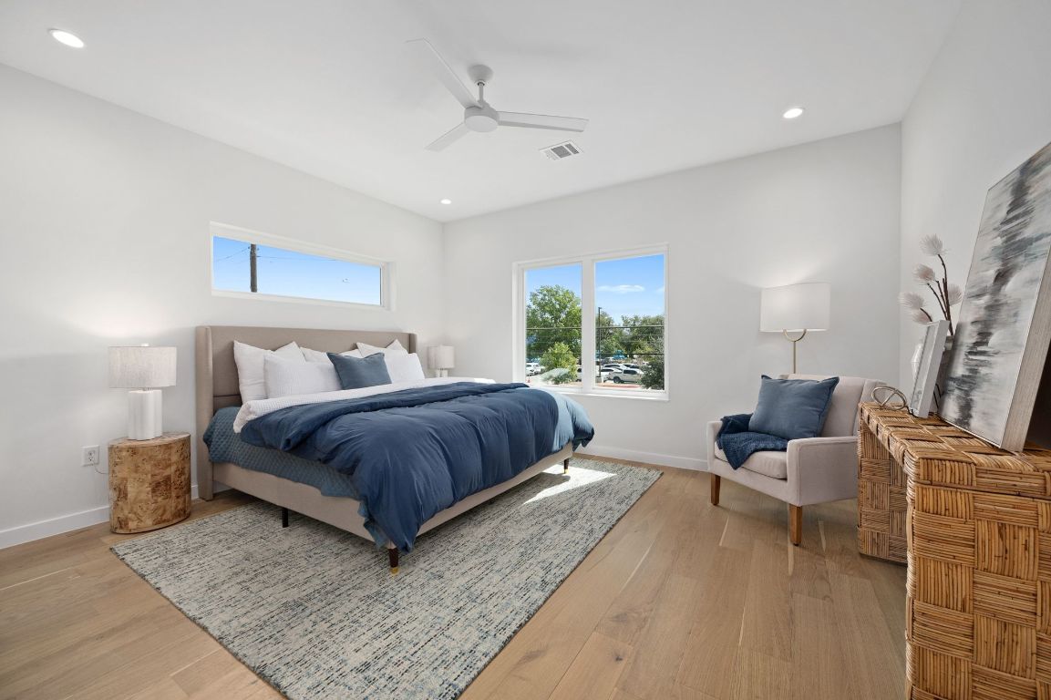 1104 Gunter Street, Unit 1/2 Austin, TX 78702 - Photo 26 of 40 a bedroom with a bed and window