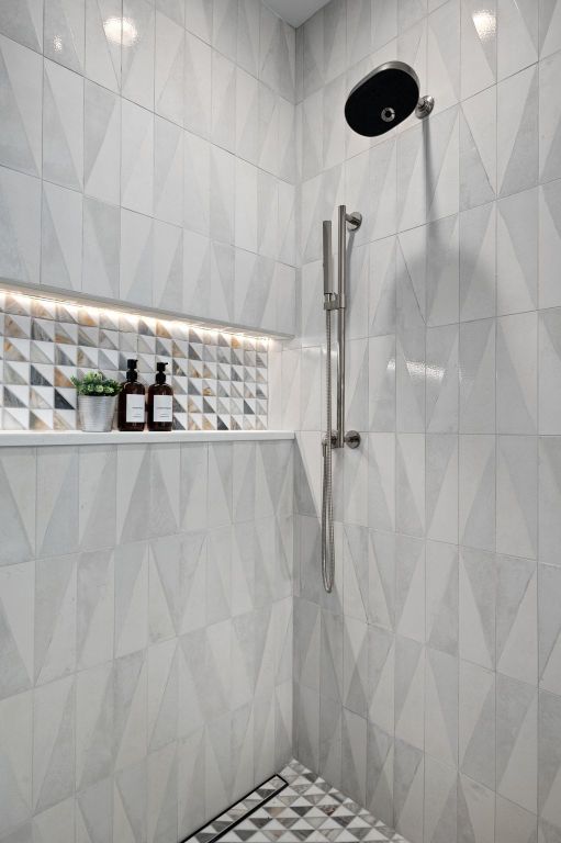 1104 Gunter Street, Unit 1/2 Austin, TX 78702 - Photo 30 of 40 a bathroom with a shower