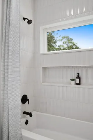 a bathroom with a bathtub