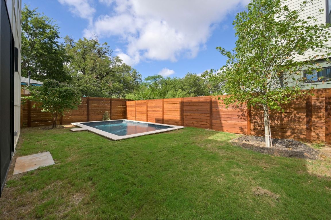 1104 Gunter Street, Unit 1/2 Austin, TX 78702 - Photo 37 of 40 a view of a backyard with a garden