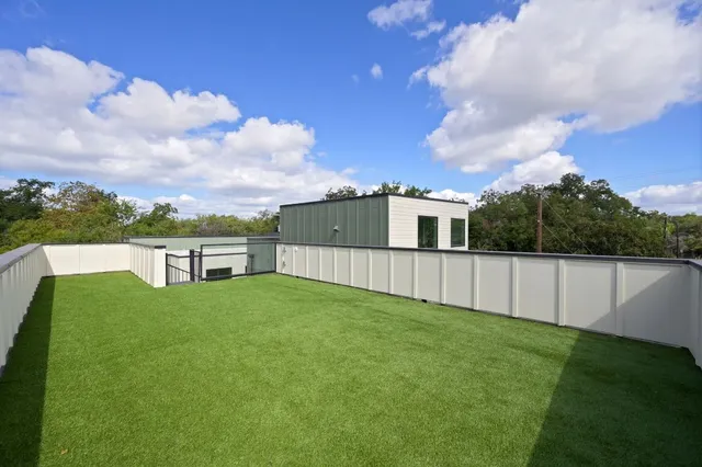 a view of a backyard with a garden