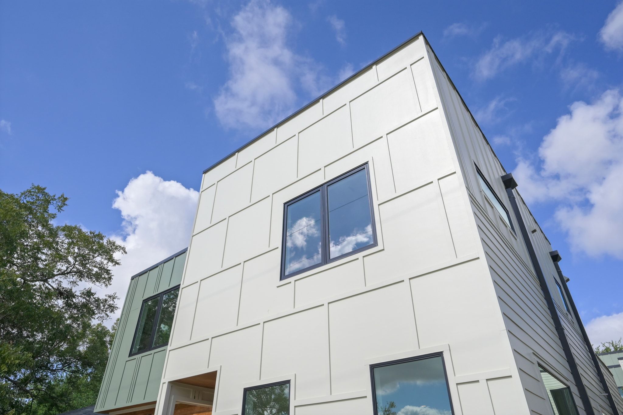 1104 1/2 Gunter Street Austin, TX 78702 - Photo 9 of 40 a backyard of a house with wooden floor and fence and a ceiling fan
