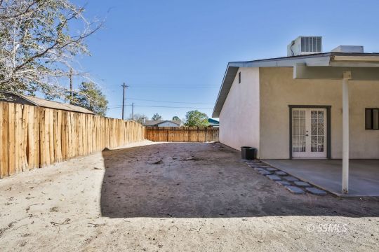 832 Walker Lane Ridgecrest, CA 93555 - Photo 22 of 23 a view of a house with a snow in the background