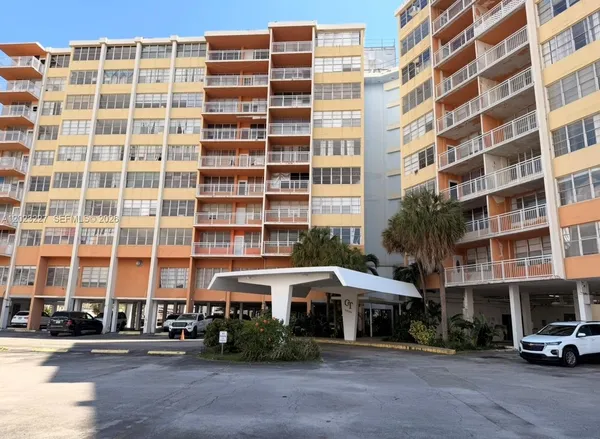 a front view of a building with a street