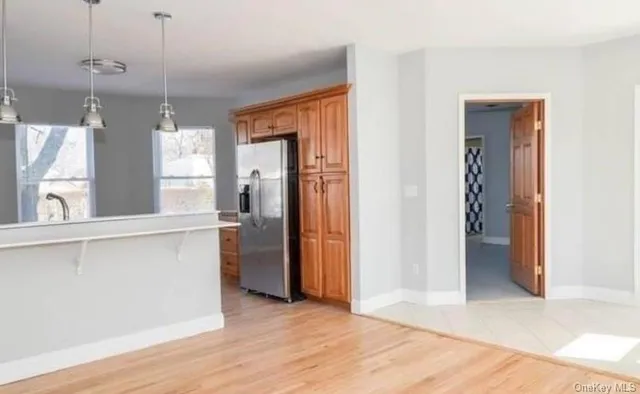 a view of a kitchen from the hallway