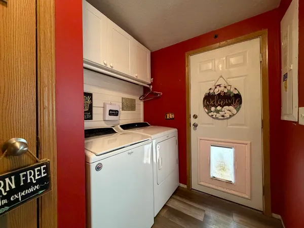 a utility room with dryer and washer