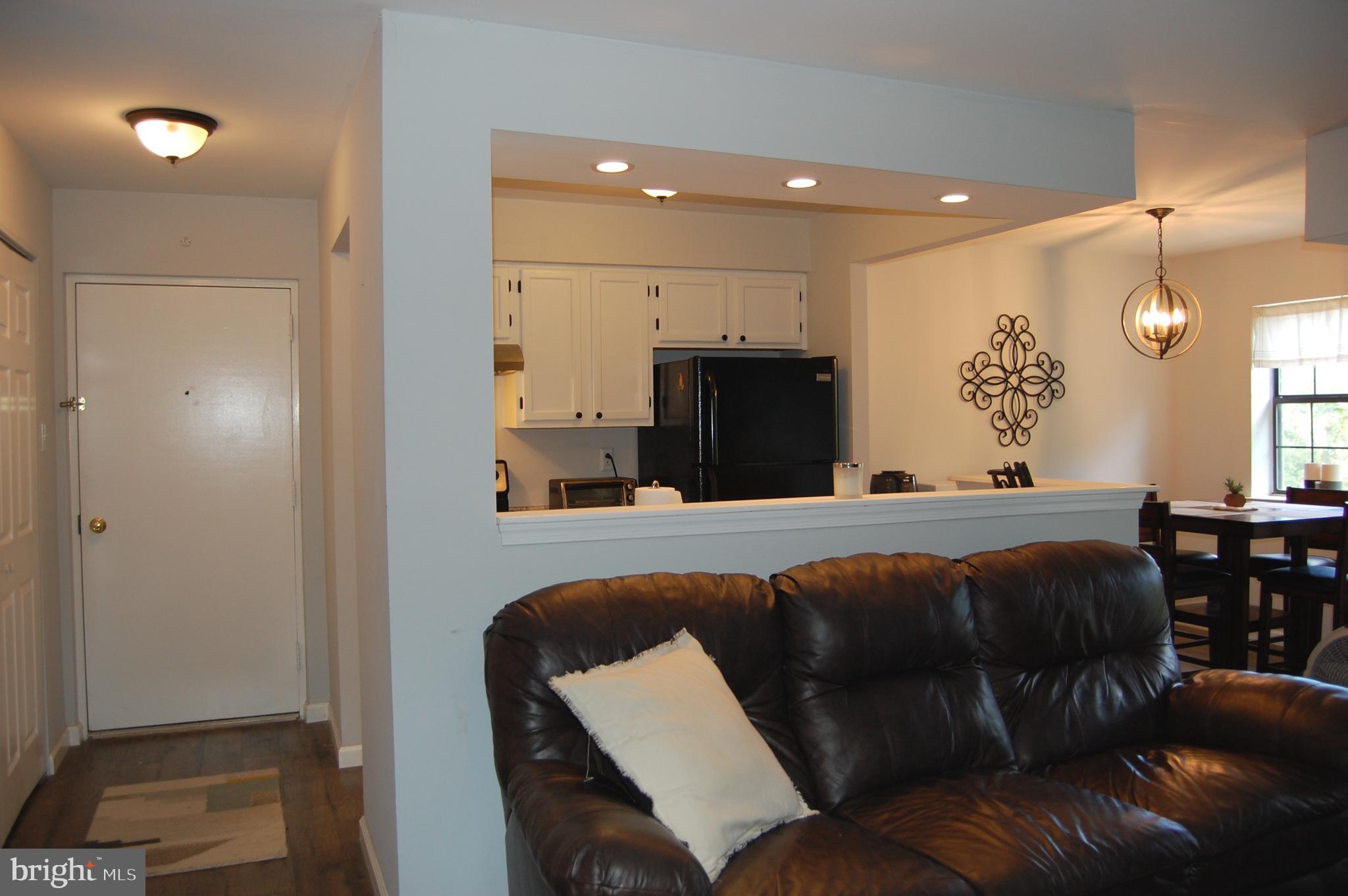 2220 Eagle Road West Chester, PA 19382 - Photo 4 of 25 Living room looking toward kitchen and dining room