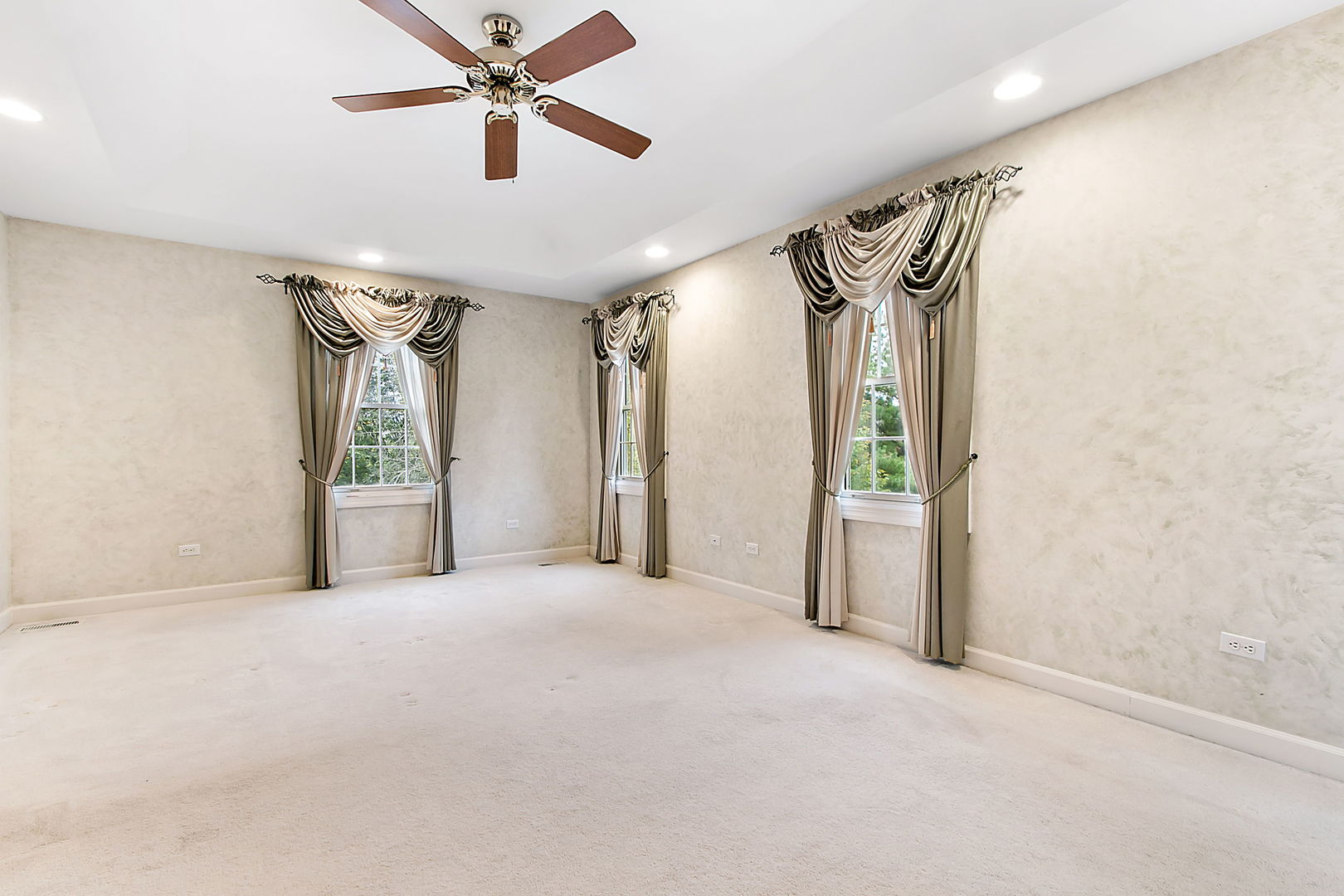 920 Merrill New Road Sugar Grove, IL 60554 - Photo 12 of 18 a view of a hallway with a chandelier fan and windows