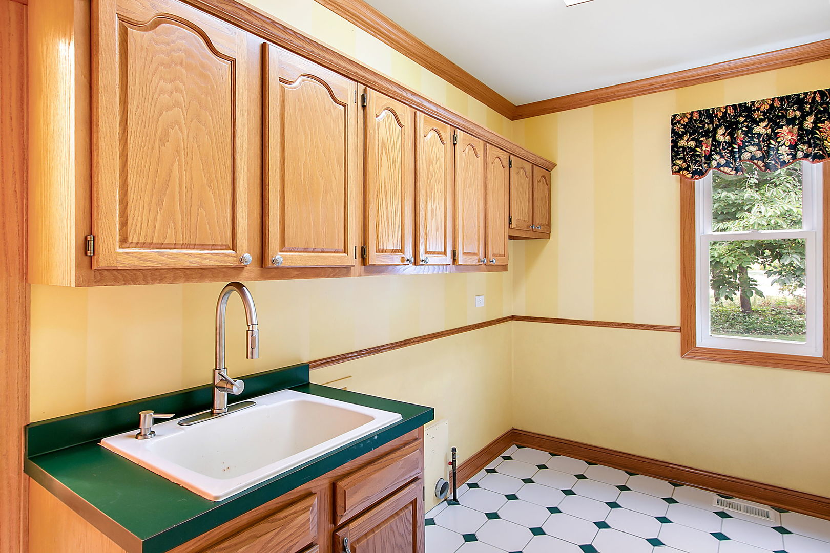 920 Merrill New Road Sugar Grove, IL 60554 - Photo 8 of 18 a bathroom with a sink a mirror and a window