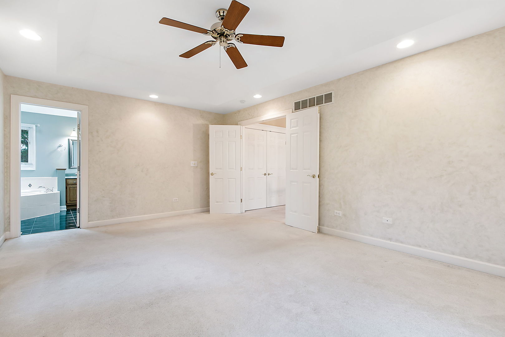920 Merrill New Road Sugar Grove, IL 60554 - Photo 9 of 18 an empty room with chandelier fan