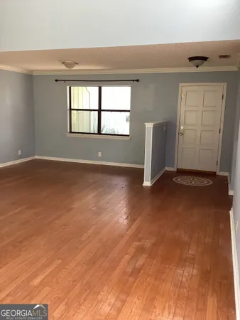 an empty room with windows