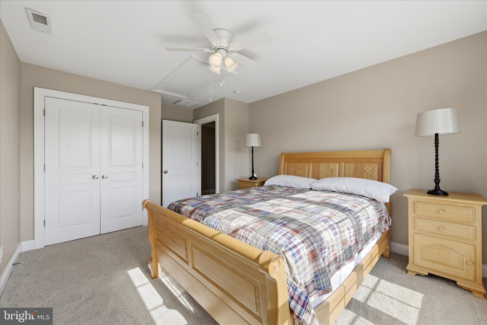 2230 Jones Road Winchester, VA 22602 - Photo 35 of 83 a bedroom with a bed and a chandelier
