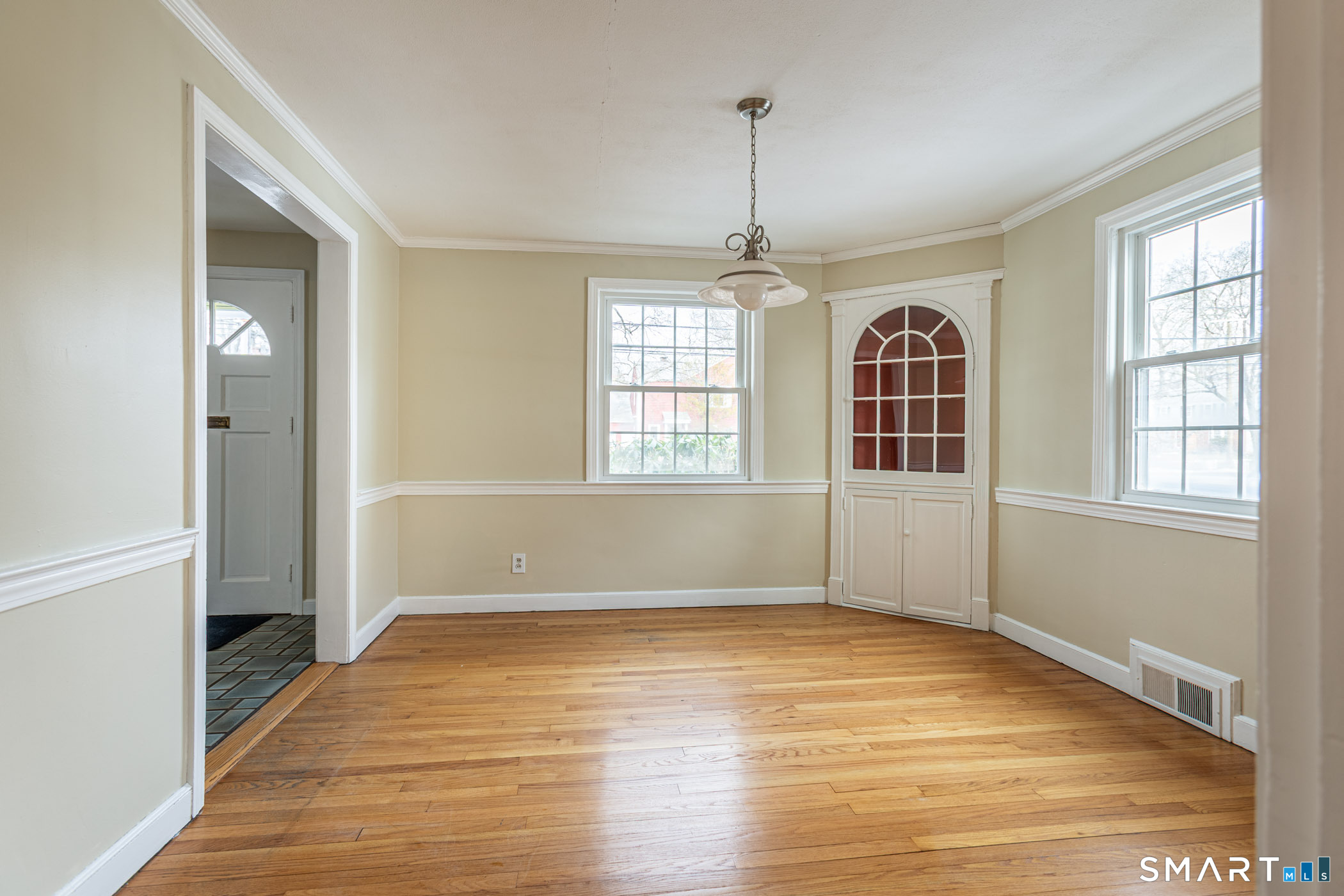 5 Lawler Road West Hartford, CT 06117 - Photo 9 of 33 a view of empty room with wooden floor and fan