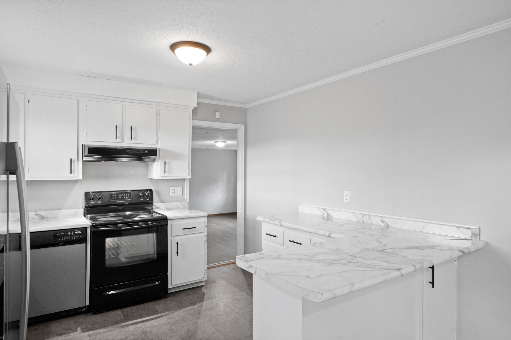 234 Old Trenton Road Clarksville, TN 37040 - Photo 11 of 25 a kitchen with granite countertop a stove and a sink