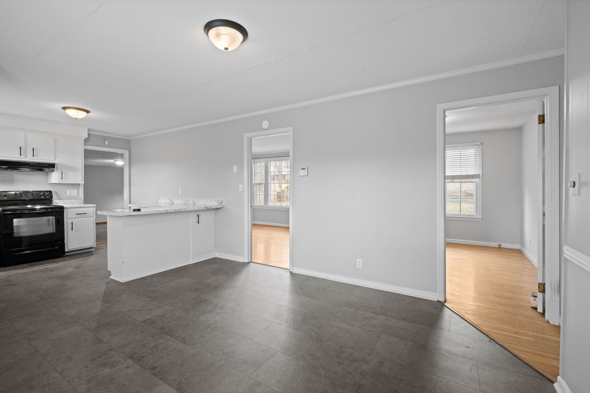 234 Old Trenton Road Clarksville, TN 37040 - Photo 12 of 25 a view of a kitchen with microwave and cabinets