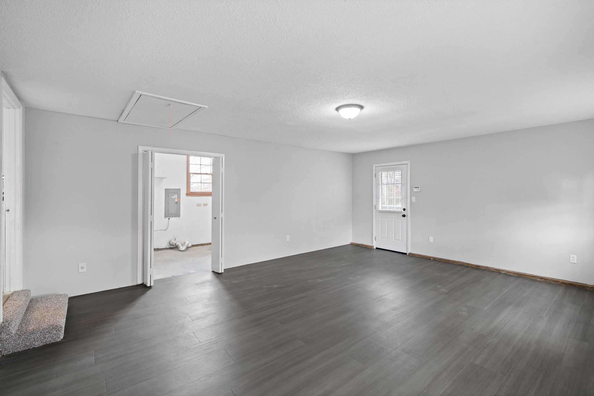 234 Old Trenton Road Clarksville, TN 37040 - Photo 13 of 25 a view of an empty room with wooden floor and closet