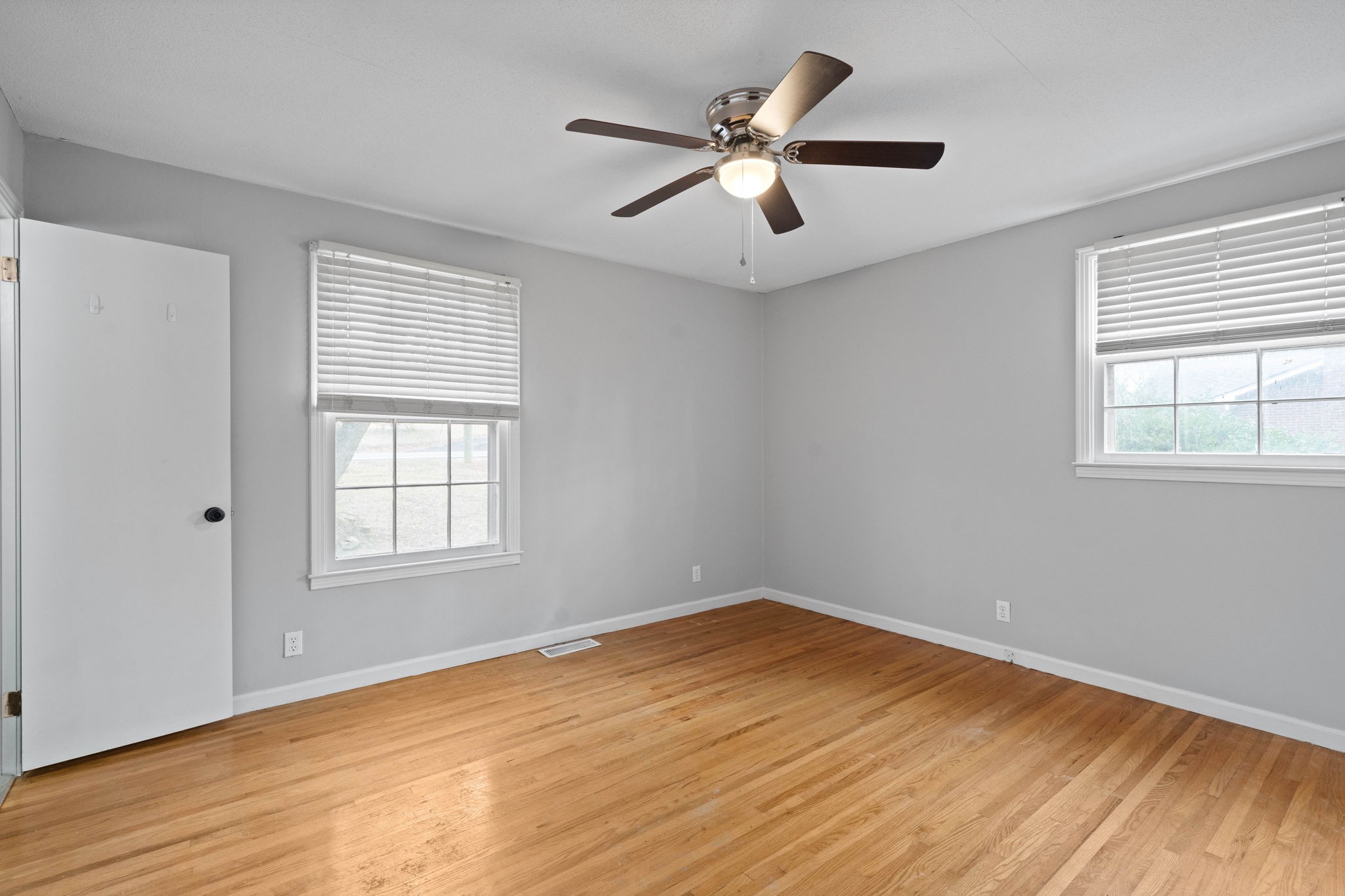 234 Old Trenton Road Clarksville, TN 37040 - Photo 19 of 25 a view of empty room with wooden floor and fan