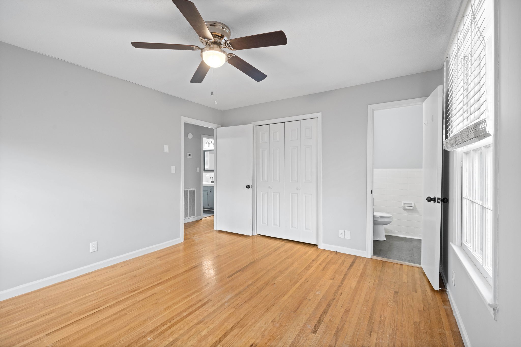 234 Old Trenton Road Clarksville, TN 37040 - Photo 20 of 25 wooden floor in an empty room with a window