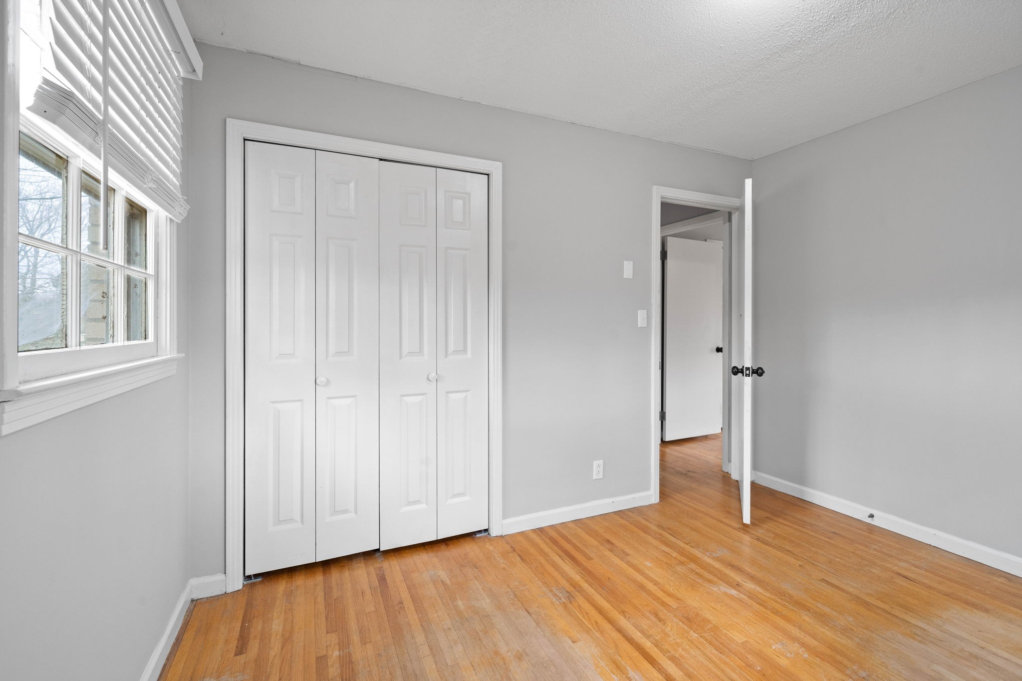 234 Old Trenton Road Clarksville, TN 37040 - Photo 23 of 25 a view of an empty room with wooden floor and a window