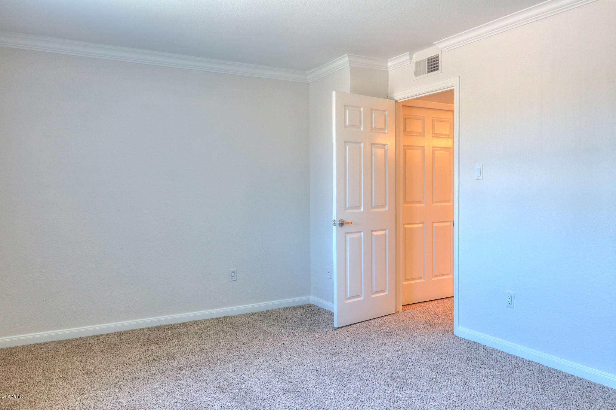 8256 East Arabian Trail, Unit 237 Scottsdale, AZ 85258 - Photo 16 of 31 a view of an empty room and a window