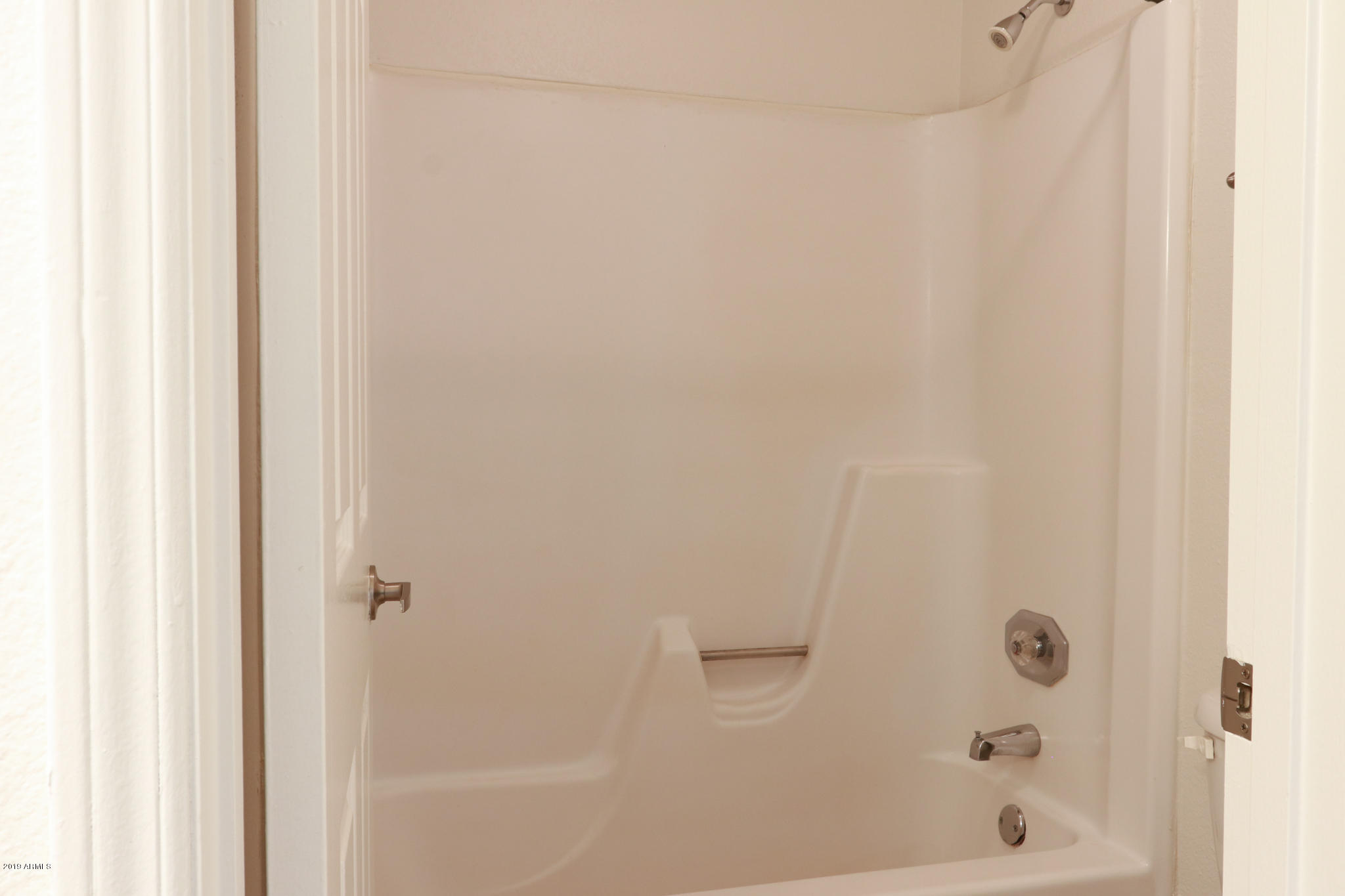 8256 East Arabian Trail, Unit 237 Scottsdale, AZ 85258 - Photo 19 of 31 a bathroom with a bathtub