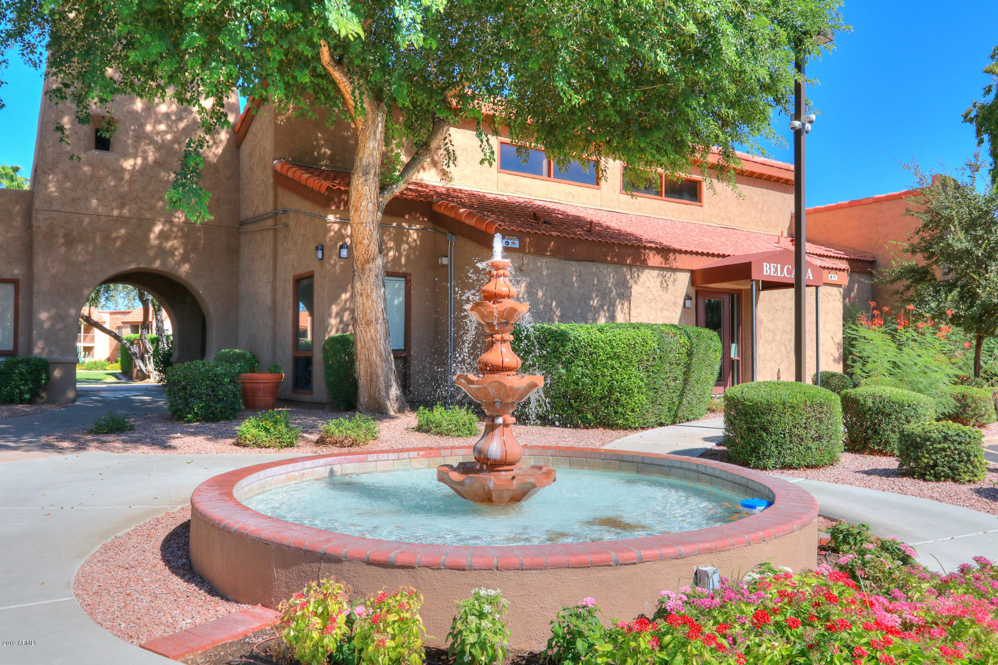 8256 East Arabian Trail, Unit 237 Scottsdale, AZ 85258 - Photo 24 of 31 a house view with a outdoor space