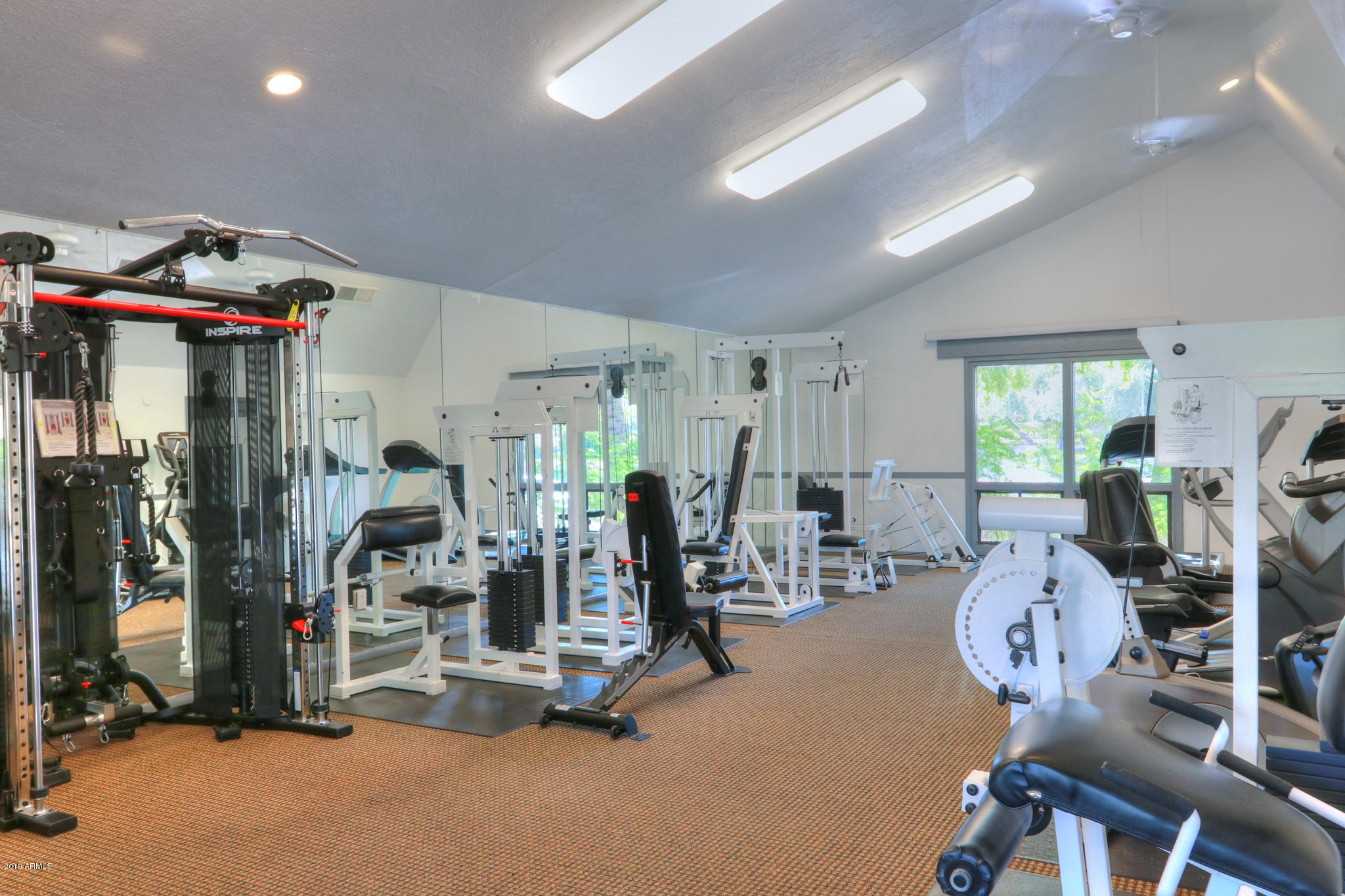 8256 East Arabian Trail, Unit 237 Scottsdale, AZ 85258 - Photo 26 of 31 a view of a room with gym equipment