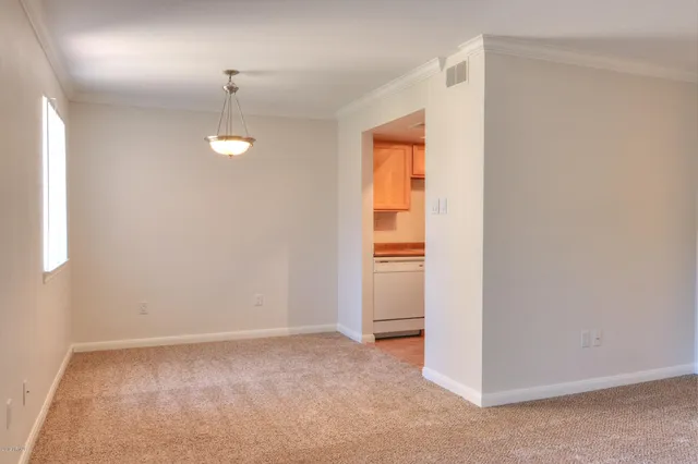 an empty room with window